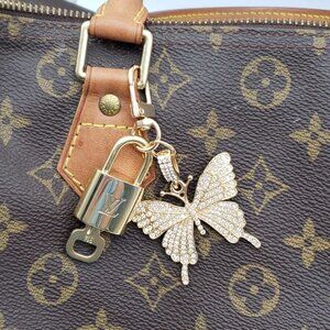 100% Auth Louis Vuitton Lock & Key with unbranded Bagcharm, Keycharm, Keychain